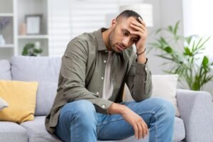 A worried man wondering, “Can I sue an insurance company in Texas?”